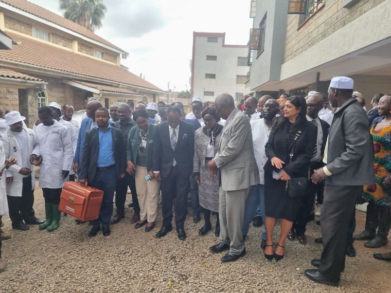 Members and guests gather in the courtyard